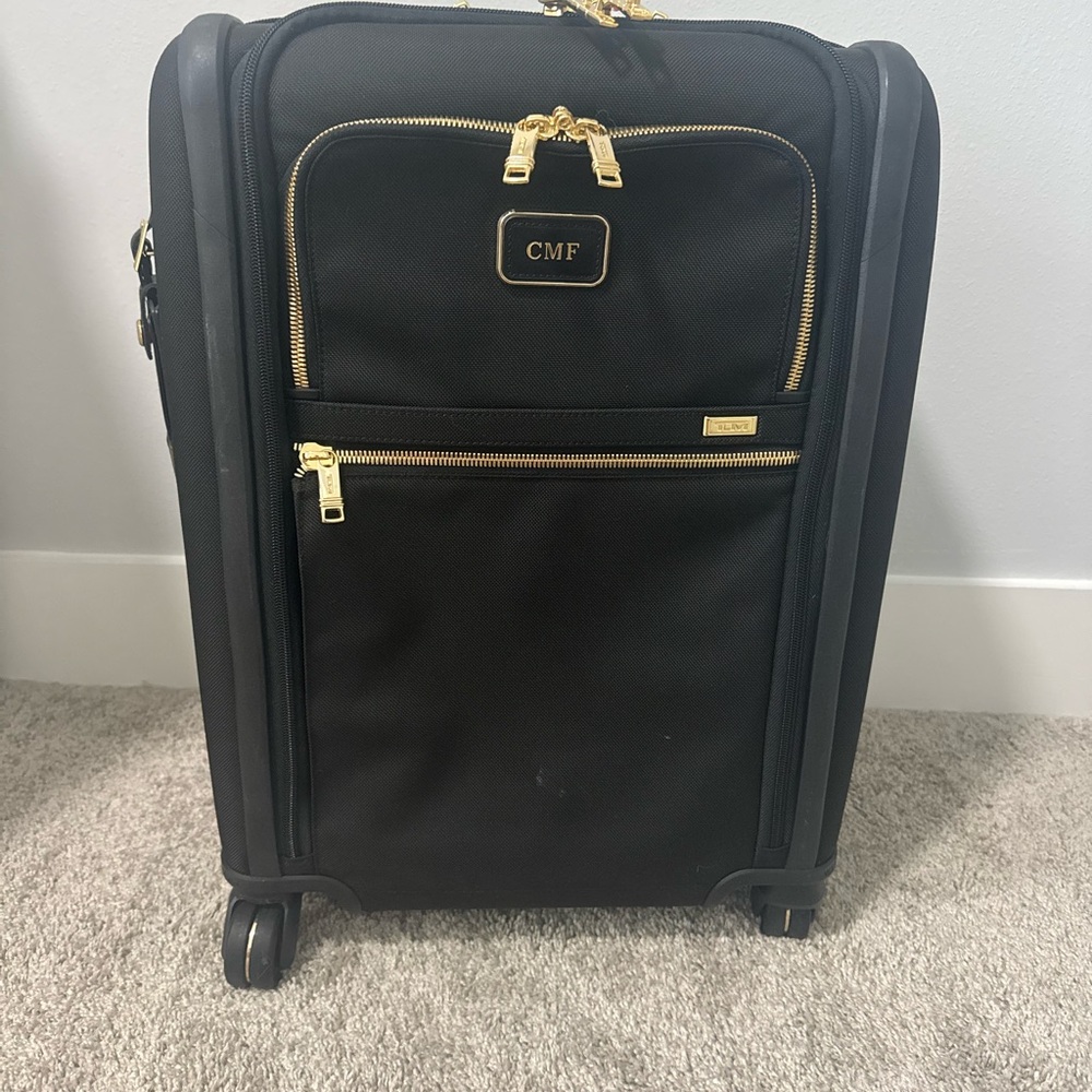 Tumi Black and Gold Travel Bag